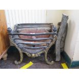 A cast iron fire basket, with brass finish acanthus scroll feet, 48 cm wide