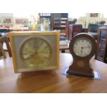 An Edwardian balloon shape table timepiece, the case with patera inlay, enamelled dial, 8 day spring