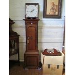 An early 19th century oak and mahogany crossbanded longcase clock, the painted square dial inscribed