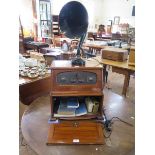 A walnut cased Pye Radio, numbered C 37718, an S.G. Brown Type F earpiece, a Louis Marx & Co. '