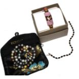 A string of multi colour Honora cultured pearls, a multi colour stone bracelet in original box, a