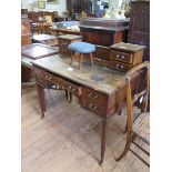 An Edwardian satinwood crossbanded mahogany lady's writing table, the raised back with four