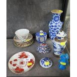 A famille rose tea bowl and saucer, other saucers, two vases and other Oriental wares, all with