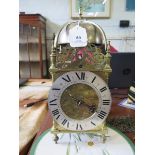 An 18th century brass lantern clock, the rose engraved dial inscribed John Watts Stamford, with