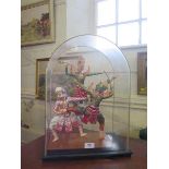 A Bangkok Dolls figure group, depicting three dancers, in a glazed case, 47.5 cm high