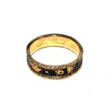 A Victorian memorial ring, some black enamel worn away