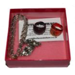 A stone set bracelet together with a pair of matching earrings by Butler & Wilson in original box,