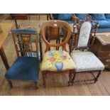 A Victorian rosewood barley-twist occasional chair, an inlaid Edwardian fireside chair, and a