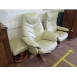 An Ekornes Stressless cream leather upholstered armchair and footstool, and another cream