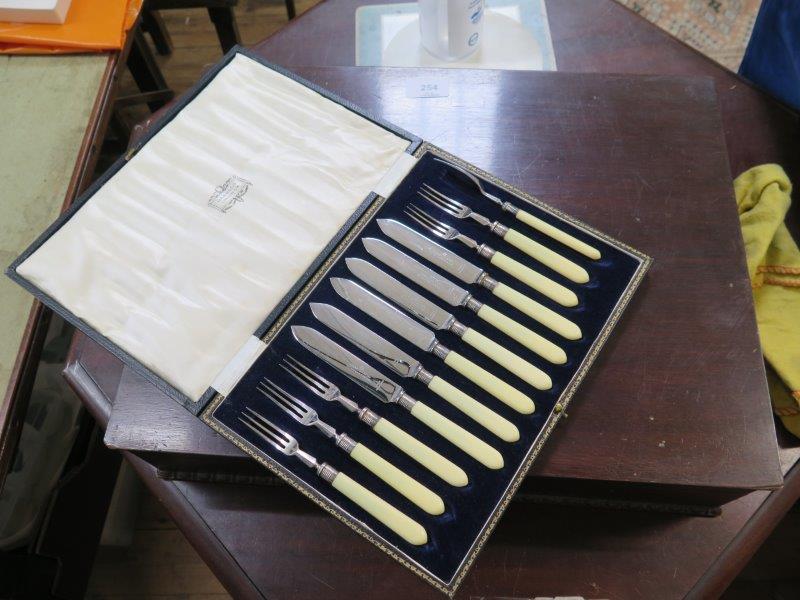 A canteen of cutlery for six place settings together with cased set of tea knives and forks from