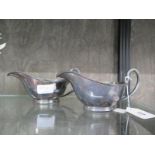 A pair of electroplated gravy boats