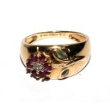 A 9 carat gold ring, set with ruby and diamond flower