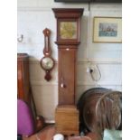 An oak longcase clock, the brass 10 inch dial with scroll spandrels and engraved Thomas Ollive