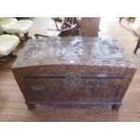 A carved camphorwood chest, with bowed top and shaped feet, 105 cm wide, 69 cm high, 51.5 cm deep