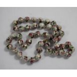 A string of cloisonne beads