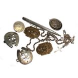 A small collection of silver items to include propelling pencil locket, a buckle made from horse