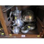 A Victorian silver plated coffee pot and milk jug, a pewter sugar bowl and cream jug, a pair of wine