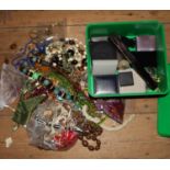 Various boxed costume jewellery and a large bag of costume jewellery