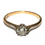 A single stone diamond ring set in 18 carat gold and platinum