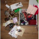 One box and a large bag of costume jewellery