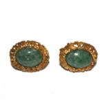 A pair of 18 carat gold cufflinks set with cabochon jade