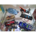 TV and film related diecast vehicles: Corgi Batmobile, Batboat, 261 James Bond Aston Martin Steed