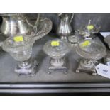 Five Continental cut glass sweet meat dishes on silver bases, all different, one damaged