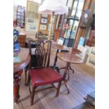 A George III style mahogany dining chair, with interlaced splat, leather seat and square legs joined
