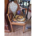 A late 19th century Viennese mahogany corner chair, in the Secessionist style, on square tapering