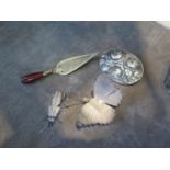 A silver brooch, figures of a beetle and a moth, and a trowel shaped bookmark (4)