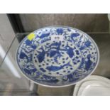 A Chinese blue and white bowl, with fish and lotus leaf design throughout, six character mark to the