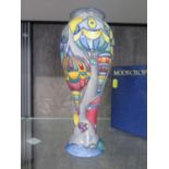 A Moorcroft Pottery inverted baluster vase, with hot air balloon design for 1999, stamped MDS on the