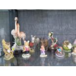 Various animal figurines, including Royal Doulton, Beswick, Country Artists and others