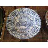 An 18th century English Delft charger, in the continental style, depicting a figure on horseback