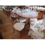 A set of four Victorian balloon back dining chairs, with cabriole legs, another pair similar, and