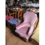 An Edwardian Queen Anne style carver chair, with inlaid vase shape splat, overstuffed seat and