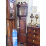 An early 19th century oak and mahogany crossbanded longcase clock, the swan neck pediment over a