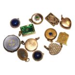 A miscellaneous collection of twelve small pendants, some gem set together with diamond and lapiz