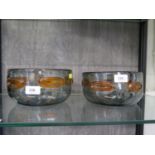 A pair of Whitefriars glass bowls, in pewter with orange medallions, 20 cm diameter, one with