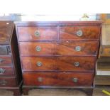 A mid 19th century mahogany chest of drawers, with two short and three long graduated drawers on