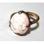 A cameo ring depicting a bust portrait of a lady set in 9 carat gold