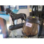 A bronze figure of a pony, on a rectangular base initialled E.R., 15 cm high and a bronze mounted