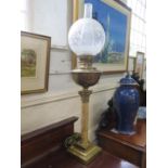 A late Victorian brass and marble oil lamp, with brass reservoir, marble stem and stepped square