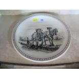 An Iden Pottery of Rye, Sussex hand painted plate with horses ploughing a field, signed verso