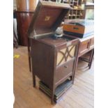 An HMV mahogany cabinet gramophone, with No.54 soundbox and silver presentation plaque, 44.5 cm wide