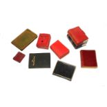 A collection of miniature books together with two packs of miniature playing cards