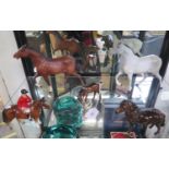 A matt finish Beswick figure of a grey horse, 21 cm high, another in brown, a Beswick figure of a