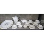 A Midwinter coffee service, including eight coffee cups and saucers, two serving plates and a