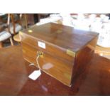 A Victorian walnut and brass bound writing box, the fitted interior with leather lined slope, 29.5