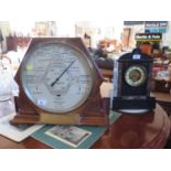 A Short & Mason Stormoguide barometer, in a hexagonal mahogany frame with a brass plaque, on a later